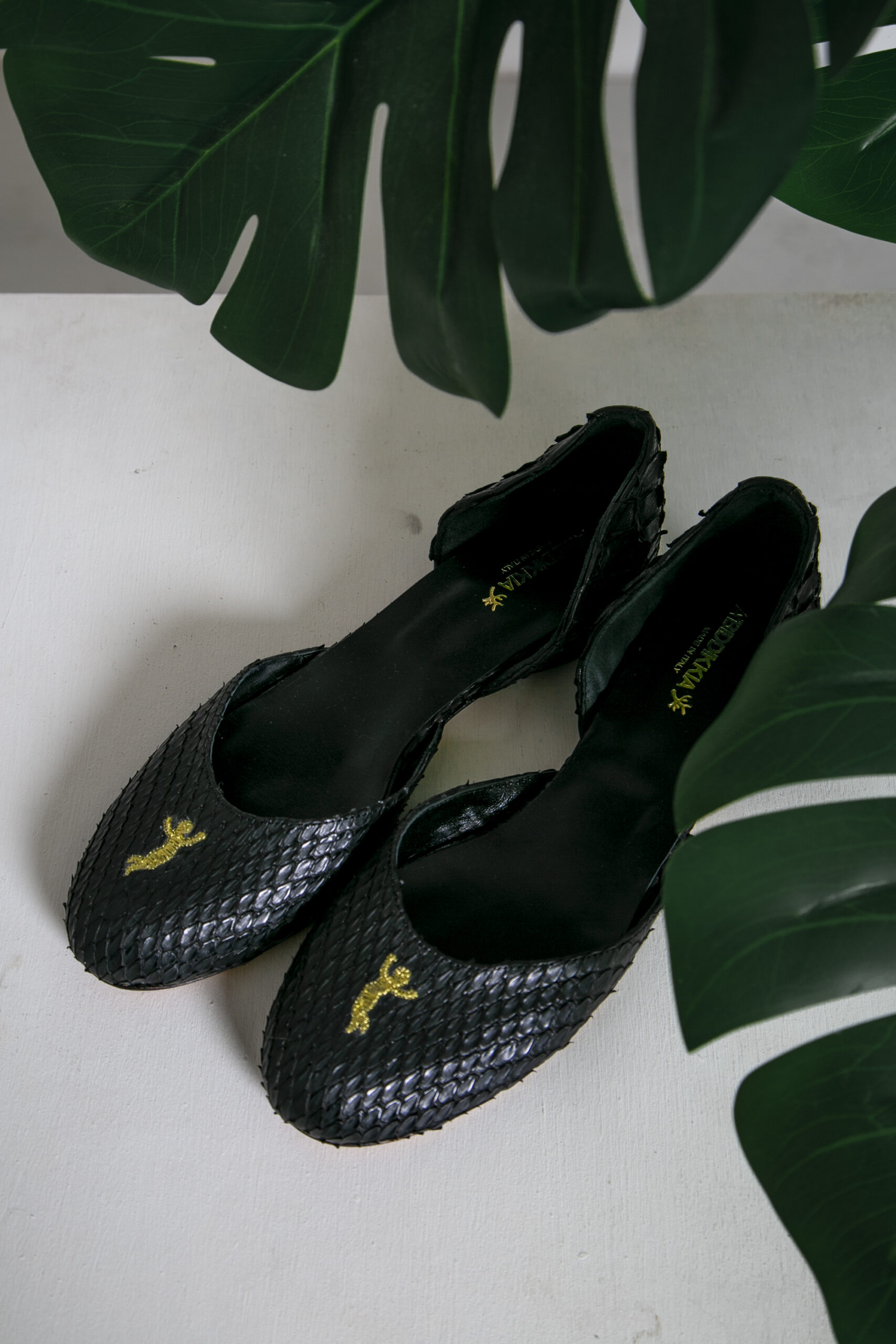 Python flats on sale