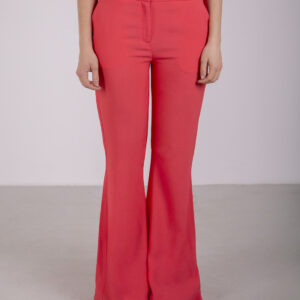 Coral-colored flare pants